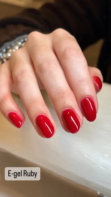 Glossy ruby-red nails